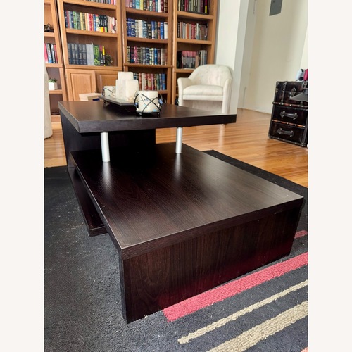 Used Dark Brown Wood Coffee Table for sale on AptDeco