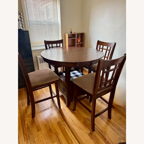 Used Dining Set w Butterfly Leaf for sale on AptDeco