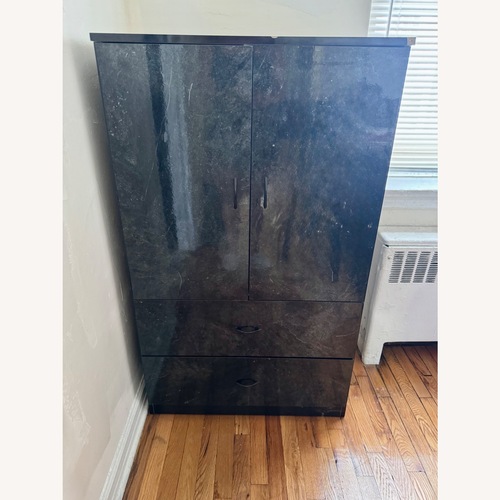 Used Black Wood Veneer Armoire Kitchen for sale on AptDeco
