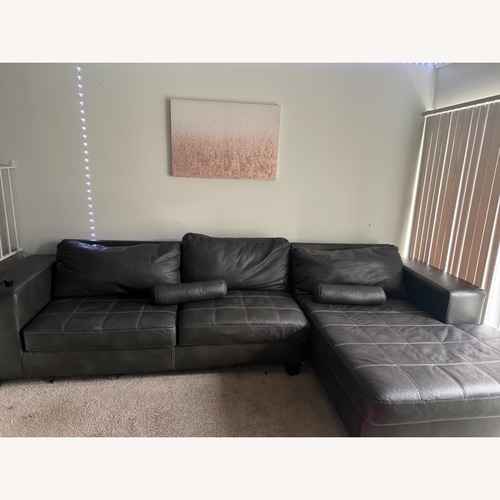 Used Dark Brown Leather Sectional for sale on AptDeco
