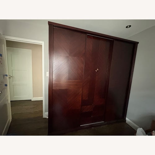 Used Solid Wood 3-Door Sliding Wardrobe/Armoire in Dark Espresso for sale on AptDeco