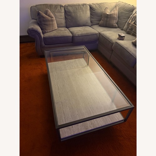 Used Raymour & Flanigan Rectangular Glass Top Coffee Table for sale on AptDeco
