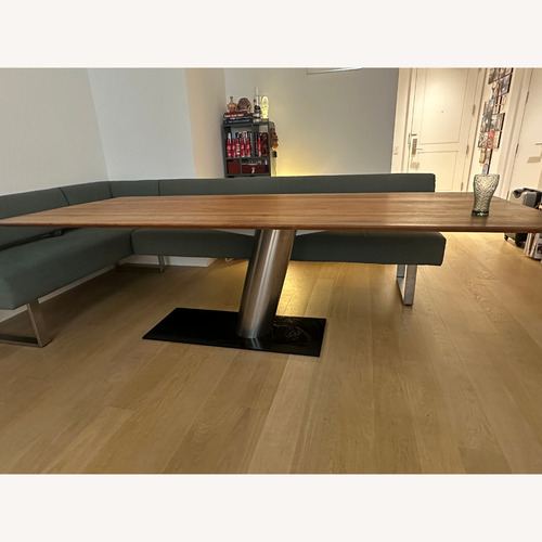 Used Light Oak Top and Metal Leg Design Dining Table for sale on AptDeco