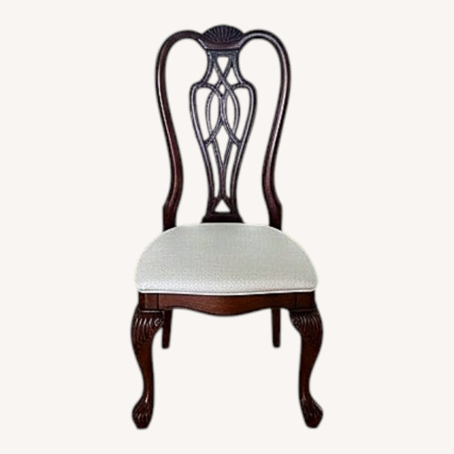 Used Dark Brown Wood Dining Chair for sale on AptDeco