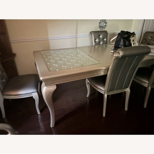 Used Silver Wood Dining Table for sale on AptDeco
