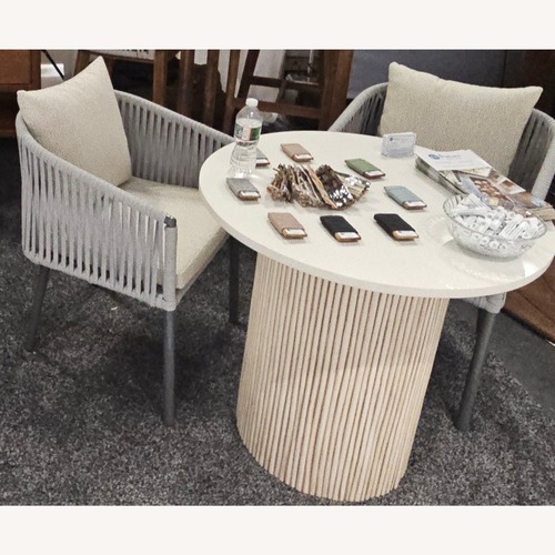Used White Rattan Coffee Table with Quartz Top for sale on AptDeco
