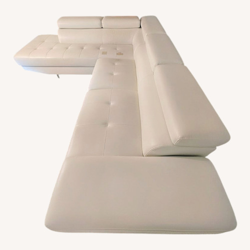 Used Faux Leather White 2 Piece Sectional  for sale on AptDeco
