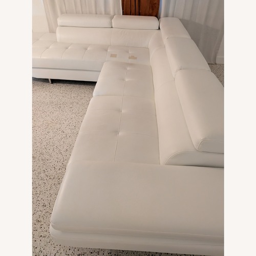 Used Faux Leather White 2 Piece Sectional  for sale on AptDeco
