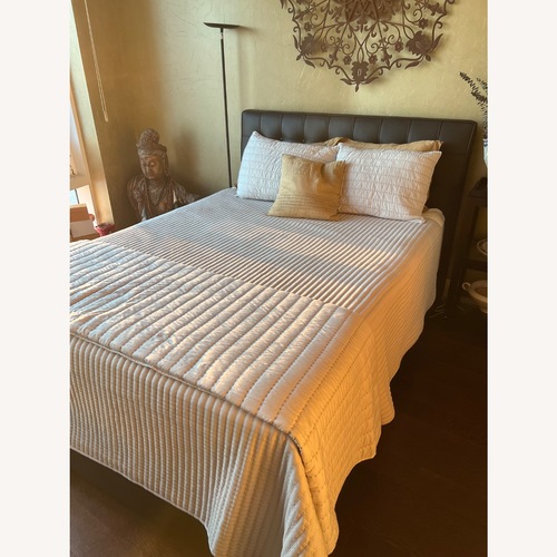 Used Leather and Wood Queen Bed for sale on AptDeco