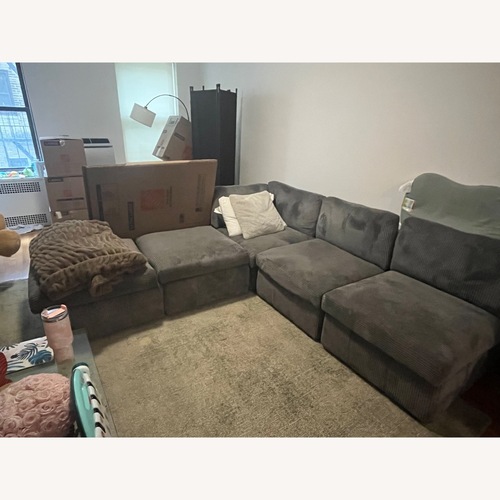 Used L-Shaped Comfy Couch for sale on AptDeco