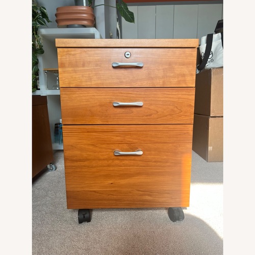 Used Light Brown Wood Veneer Filing Cabinet for sale on AptDeco