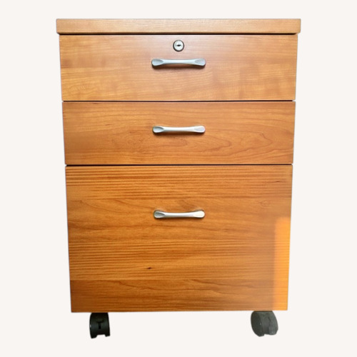 Used Light Brown Wood Veneer Filing Cabinet for sale on AptDeco