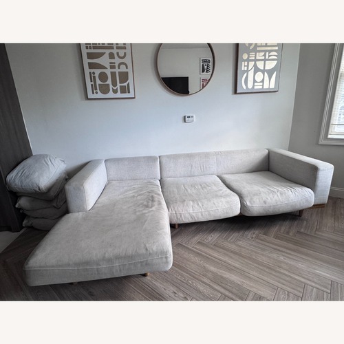 Used West Elm 2 Piece Sectional with Ottoman & Pillows for sale on AptDeco