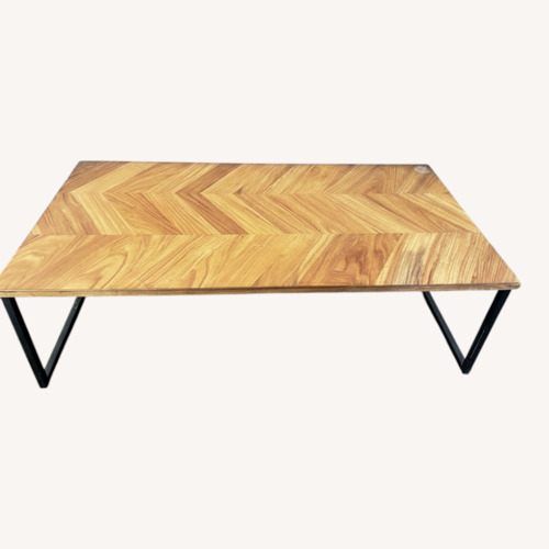 Used Chevron Wood Coffee Table Black Metal Legs for sale on AptDeco