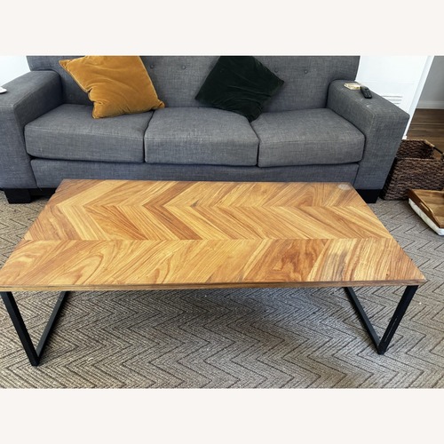 Used Chevron Wood Coffee Table Black Metal Legs for sale on AptDeco