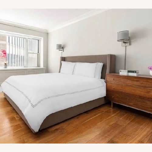 Used Room & Board Queen Upholstered Bed W Storage for sale on AptDeco