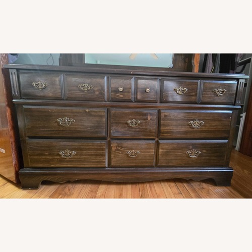 Used Dark Brown Wood Dresser for sale on AptDeco