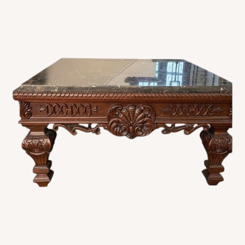 Used Ashley Furniture Dark Brown Wood Coffee Table for sale on AptDeco