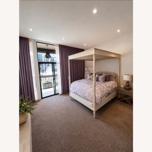 Used Jacques Canopy Queen Bed for sale on AptDeco