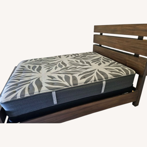 Used Ashley Furniture Dark Brown Wood Full Bed for sale on AptDeco