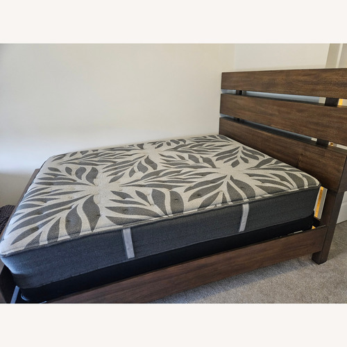 Used Ashley Furniture Dark Brown Wood Full Bed for sale on AptDeco