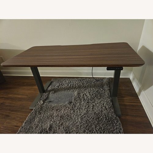 Used Dark Brown Wood Desk for sale on AptDeco
