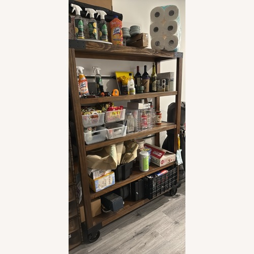 Used Dark Brown Wood Wall Shelf for sale on AptDeco
