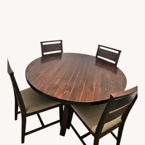 Used Dark Brown Wood Dining Set for sale on AptDeco