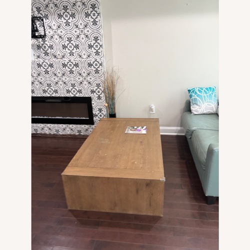 Used Light Gray Wood Coffee Table for sale on AptDeco