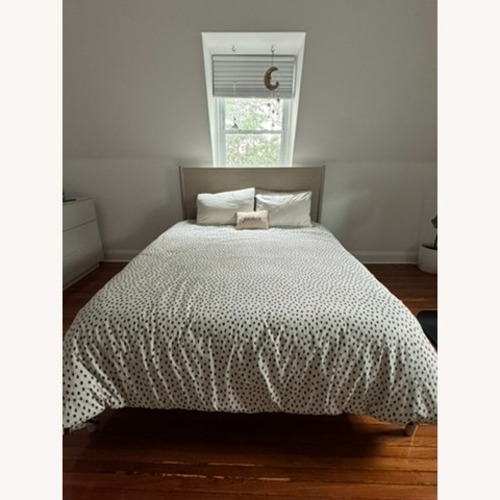 Used West Elm Natural Wood Queen Bed for sale on AptDeco