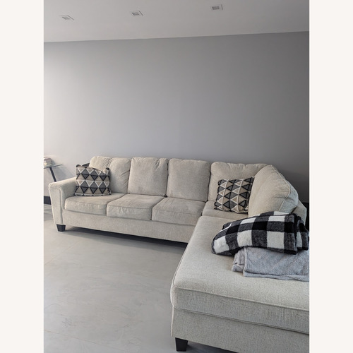 Used Ashley Furniture Abinger Chaise Sleeper Sectional Sofa for sale on AptDeco