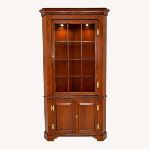 Used Henkel Harris Corner Cabinet Wild Black Cherry for sale on AptDeco
