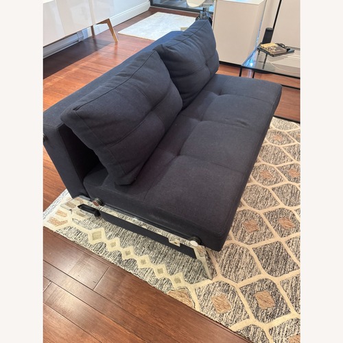 Used Dark Blue Fabric Futon for sale on AptDeco