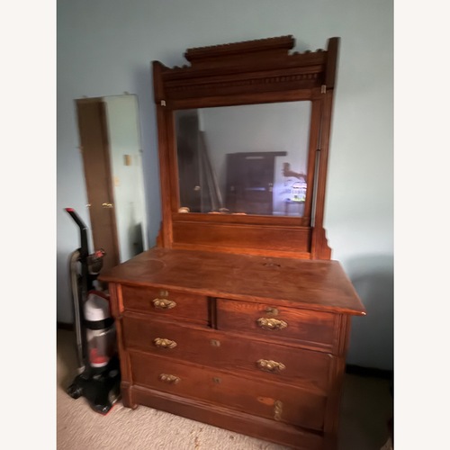 Used Dark Brown Wood Dresser for sale on AptDeco