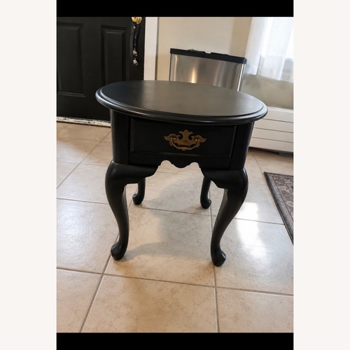 Used Vintage/Antique Finds Black Wood Coffee Table for sale on AptDeco