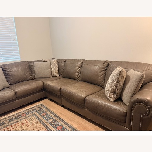 Used Grisham Italian Leather 111" 3 Piece Modular L-Shaped Sectional for sale on AptDeco