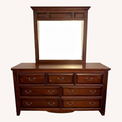 Used Raymour & Flanigan Dark Brown Wood Dresser for sale on AptDeco