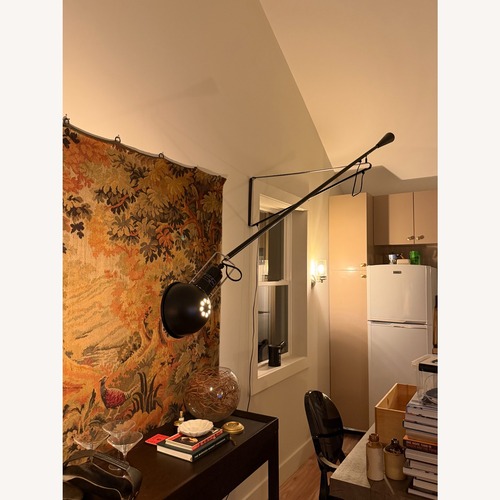 Used Flos Black Metal Wall Lamp for sale on AptDeco
