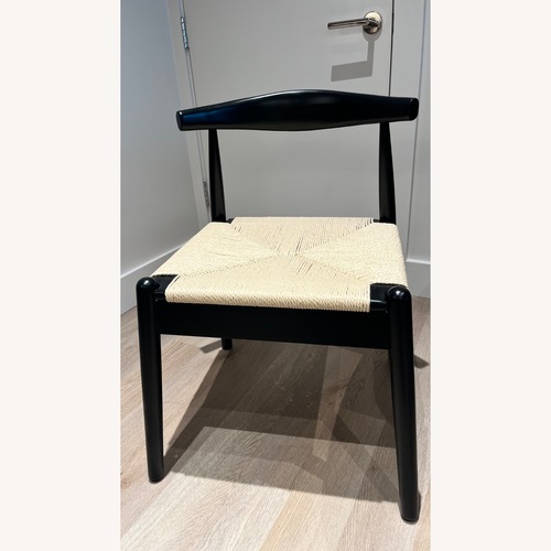 Used Black Wood Dining Chair for sale on AptDeco