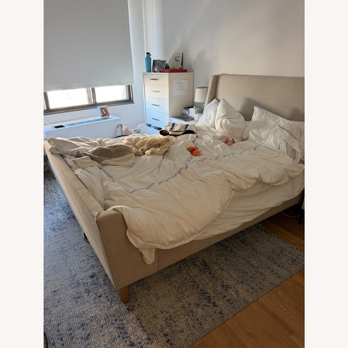 Used West Elm Grey Upholstered Sleigh Bed for sale on AptDeco