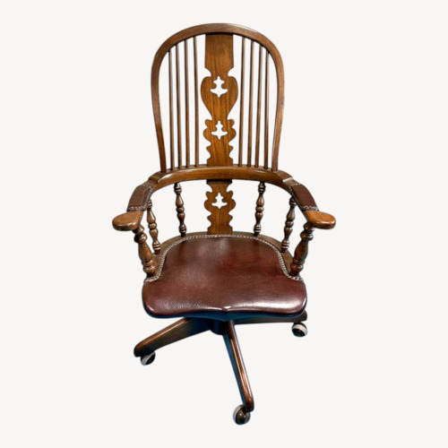 Used Conant Ball Walnut Leather Seat Wheeled Armchair for sale on AptDeco
