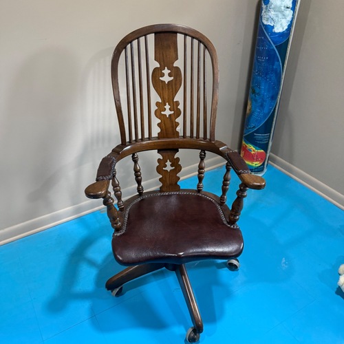 Used Conant Ball Walnut Leather Seat Wheeled Armchair for sale on AptDeco