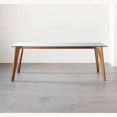 Used CB2 Harper Brass + Glass Dining Table for sale on AptDeco