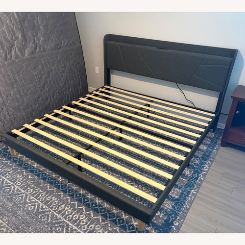 Used King Bed Frame with Charging Station for sale on AptDeco