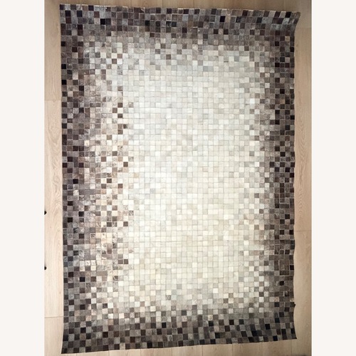 Used Modern Leather Patchwork Area Rug for sale on AptDeco