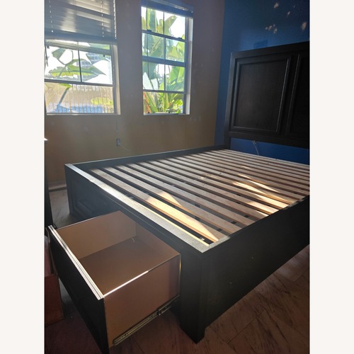 Used Black Wooden Platform Storage Bed Frame  for sale on AptDeco