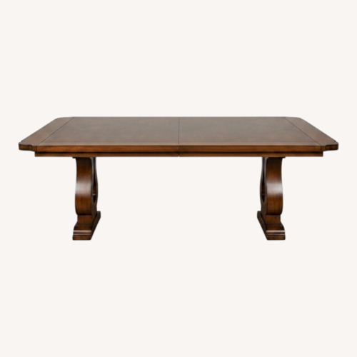 Used Solid Wood Dining Table for sale on AptDeco