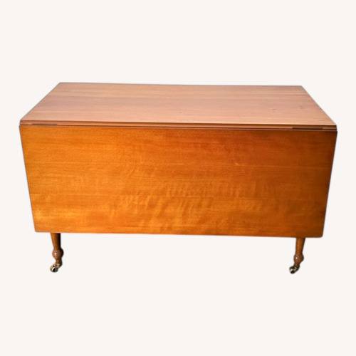 Used Vintage/Antique Finds Dark Brown Dining Table for sale on AptDeco