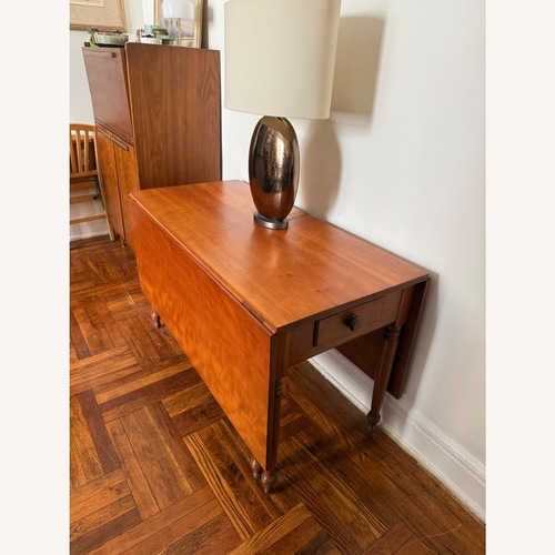 Used Vintage/Antique Finds Dark Brown Dining Table for sale on AptDeco