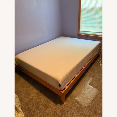 Used Natural Wood Queen Bed  for sale on AptDeco